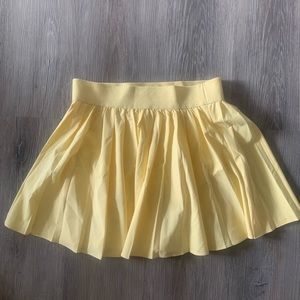 Women’s small yellow tennis skirt